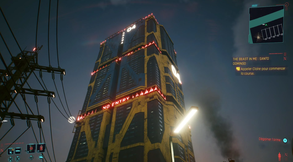 Megabuilding H4 at night with "No Entry" lights in Cyberpunk 2077.