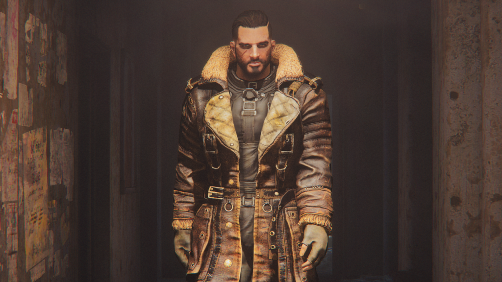 Elder Maxson in a brown leather coat in a dim hallway